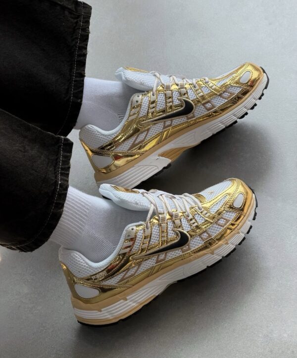 NIKE VOMERO X DORADO