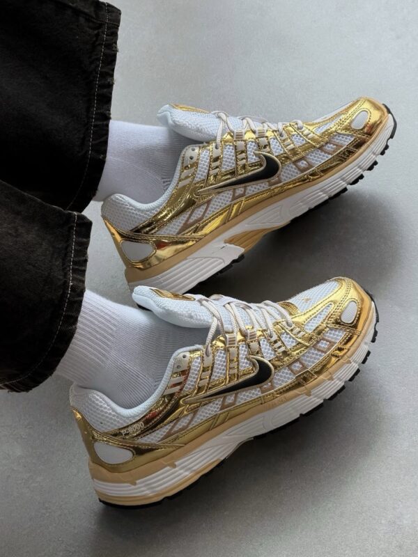 NIKE VOMERO X DORADO